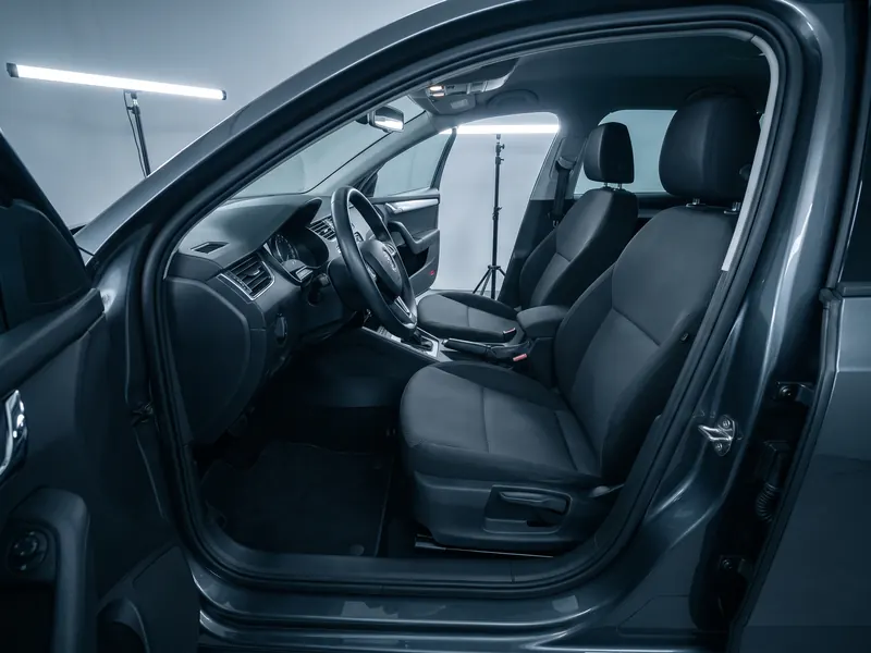 Finished cabin wide shot, doors open — Tint Express interior deluxe cleaning